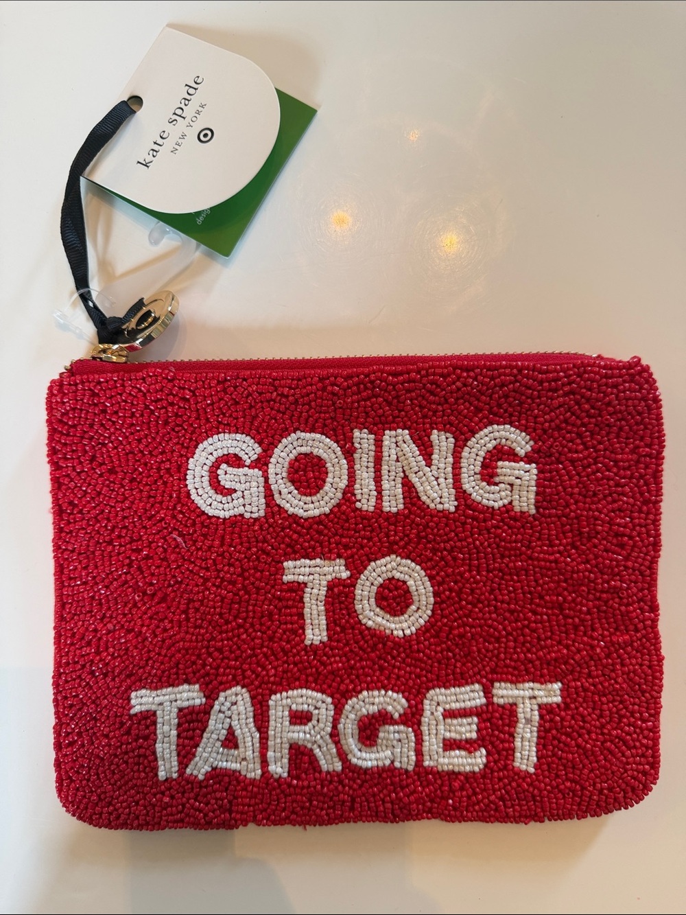 Kate Spade x TARGET…red beaded clutch with white lettering 5”x7”